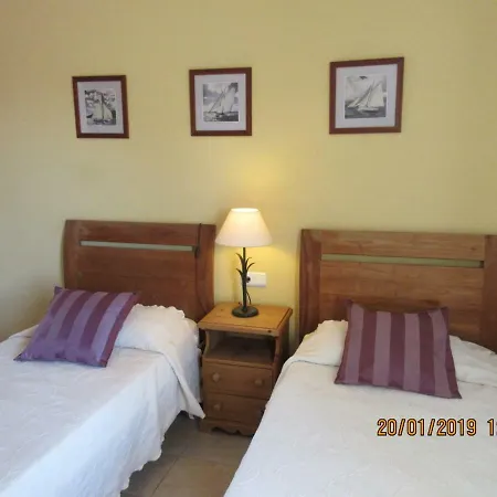 Cora Βίλα Triquivijate